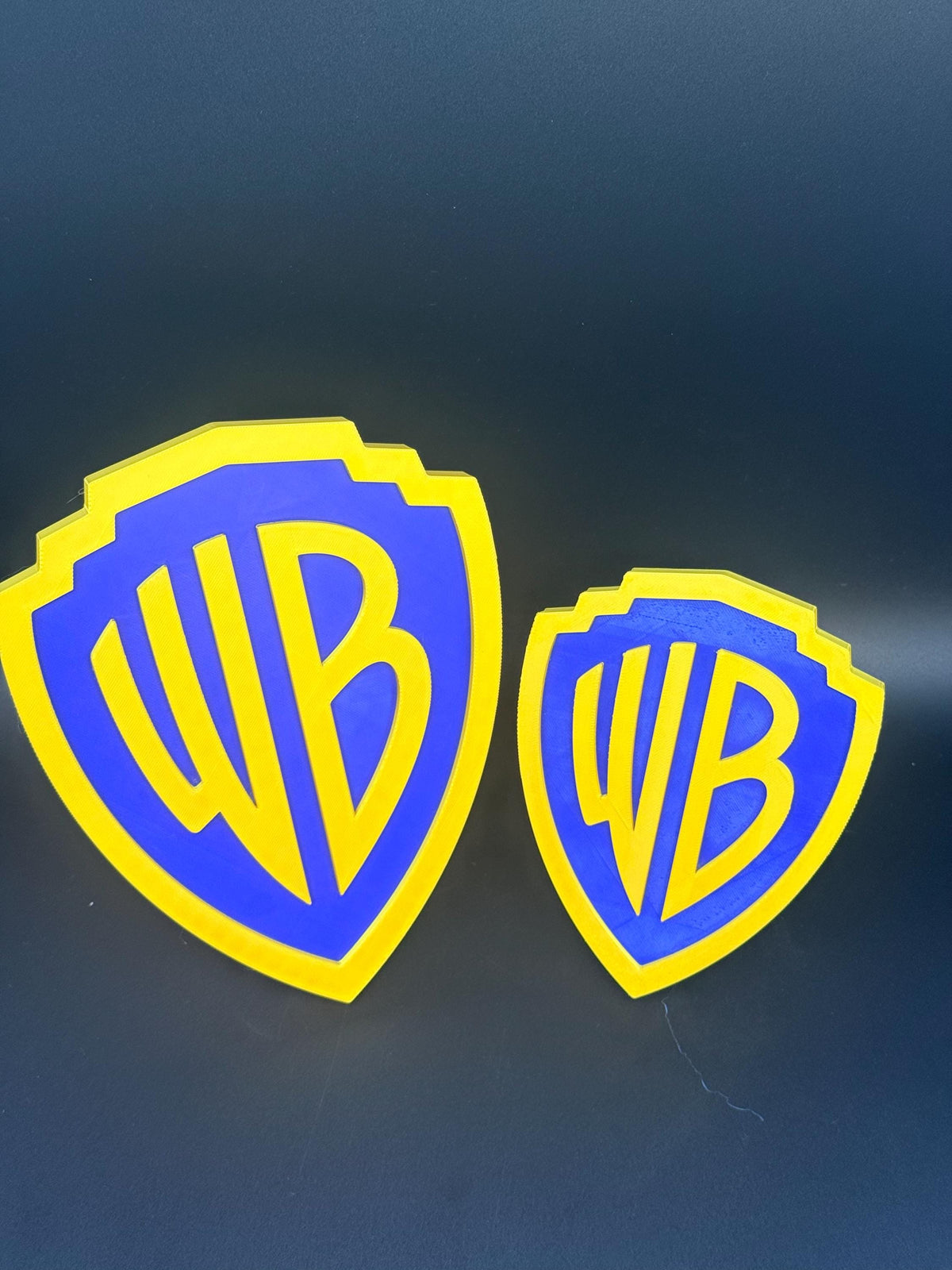 Warner Brother's Logo w/ hanging template, stand and nail hook